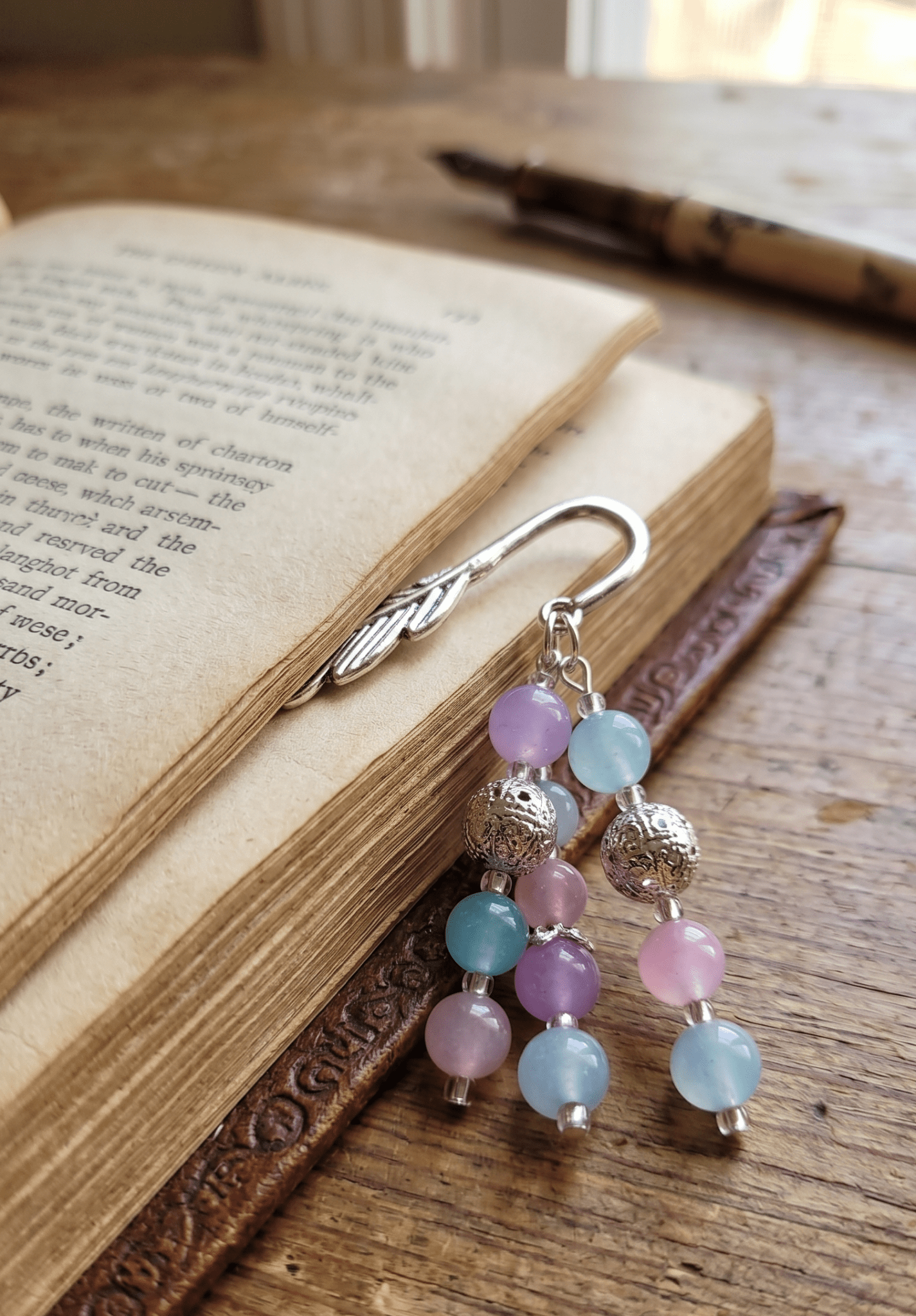 Handcrafted Silver Feather Bookmark with Pastel Ombré Glass Beads - Ko Sedibeng Designs - Bookmarks